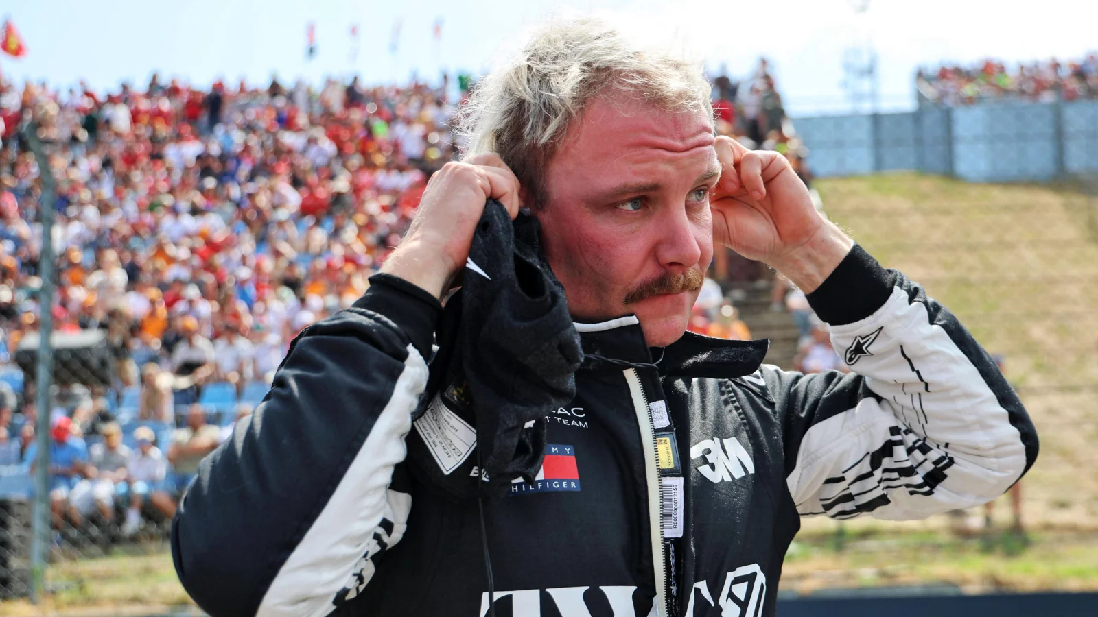 Valtteri Bottas celebrates cycling success during F1 season summer break thumbnail