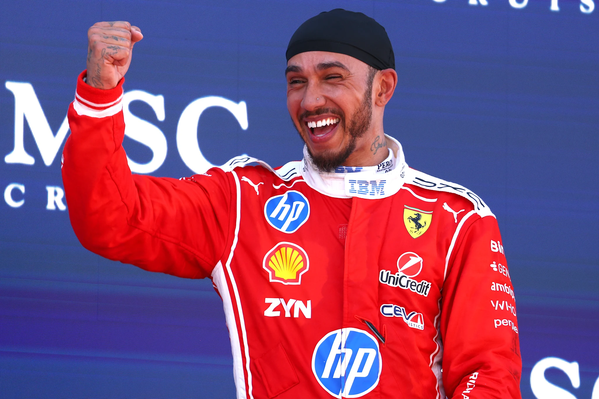 Hamilton reacts to magical maiden win with Ferrari source thumbnail
