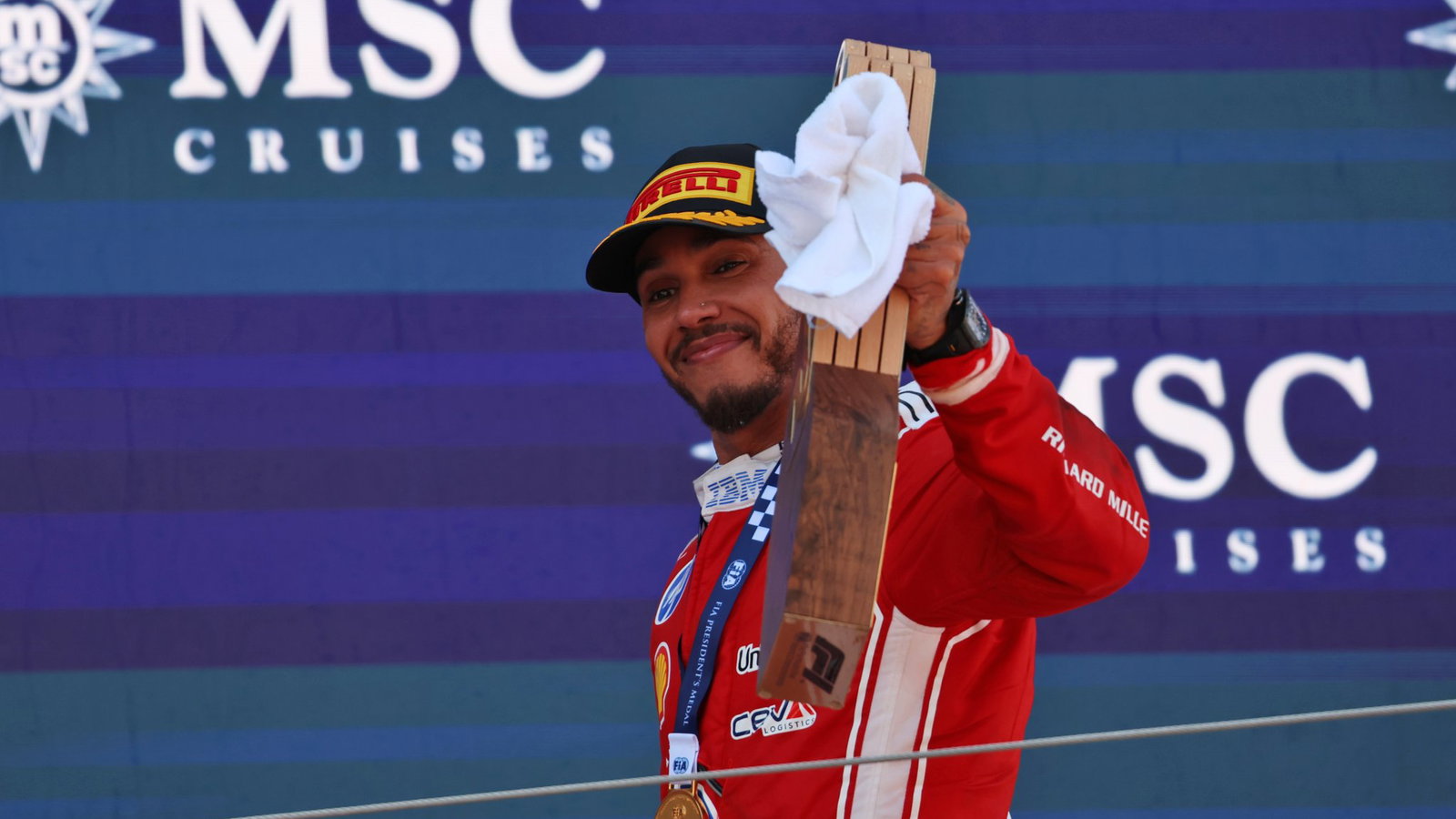 Lewis Hamilton 'overwhelmed' by reaction to his first Ferrari F1 win source thumbnail
