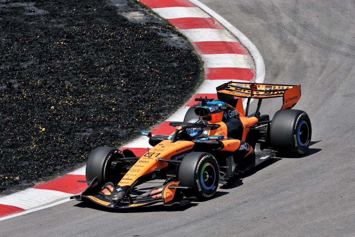 Gary Anderson on the front wing McLaren had to remove thumbnail